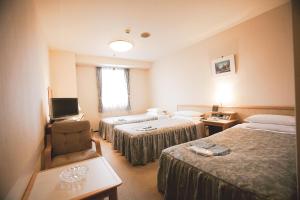 Postel nebo postele na pokoji v ubytování Narita U-City Hotel + 33 fotografií