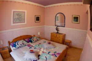 Katil atau katil-katil dalam bilik di Rooms Beros