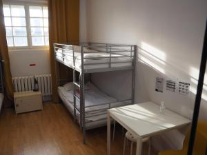 Posteľ alebo postele v izbe v ubytovaní New World St Hostel and Private Room