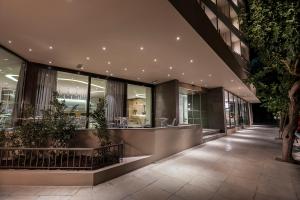 a store front of a building with a restaurant at Kriti Hotel in Chania Town