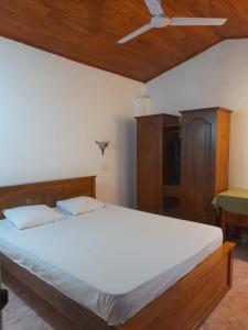 Postel nebo postele na pokoji v ubytování Ceylon Casa
