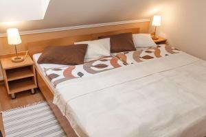 Posteľ alebo postele v izbe v ubytovaní Apartmány Podyjí
