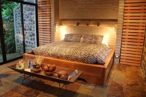 Voodi või voodid majutusasutuse Hamadryade Lodge toas