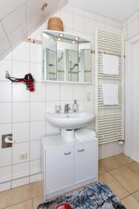 Salle de bains dans l'établissement Ferienwohnungen im Haus Ankerplatz
