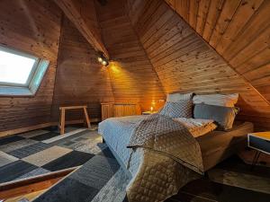 מיטה או מיטות בחדר ב-Der alte Torturm