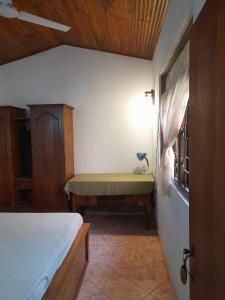 Postel nebo postele na pokoji v ubytování Ceylon Casa