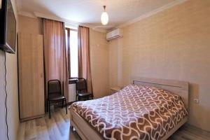 Postel nebo postele na pokoji v ubytování Villa Gio + 37 fotografií