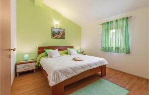 Postel nebo postele na pokoji v ubytování Holiday Home Barban 53