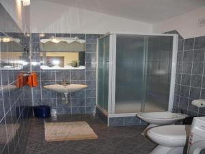 Koupelna v ubytování Apartments Račić