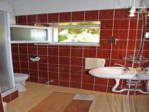 Koupelna v ubytování Apartments Račić