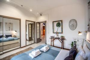 Area soggiorno di TRASTEVERE - Stylish Good Vibes Apartment