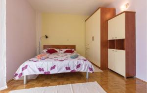 Posteľ alebo postele v izbe v ubytovaní Two-Bedroom Holiday Home In Stasevica