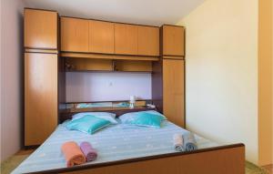 Posteľ alebo postele v izbe v ubytovaní Two-Bedroom Holiday Home In Stasevica