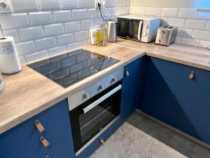 Kuchyňa alebo kuchynka v ubytovaní Mrs Holiday Apartment + 18 fotografií