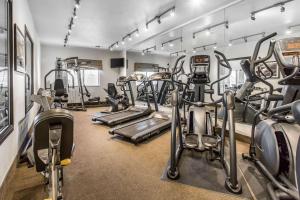 a gym with several treadmills and cardio machines at Sleep Inn & Suites Lubbock West in Lubbock