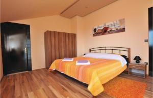 Postel nebo postele na pokoji v ubytování Holiday Home Vlaska Iii
