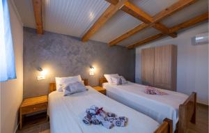 Posteľ alebo postele v izbe v ubytovaní Three-Bedroom Holiday Home 0 In Zminj