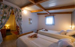 Posteľ alebo postele v izbe v ubytovaní Three-Bedroom Holiday Home 0 In Zminj