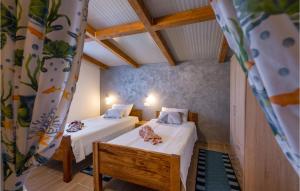 Posteľ alebo postele v izbe v ubytovaní Three-Bedroom Holiday Home 0 In Zminj