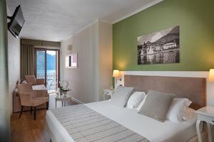 Voodi või voodid majutusasutuse Hotel Garni Corona toas