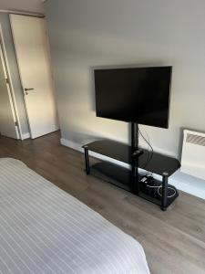 TV a/nebo společenská místnost v ubytování 14 ,Cotado Clinica las Condes, 6 Personas