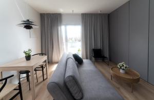 Posezení v ubytování Apartament Amelia Q4Apartments