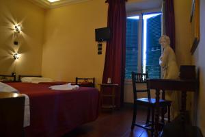 Postel nebo postele na pokoji v ubytování Hotel Al SanPietrino