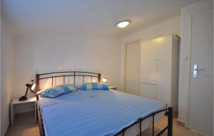 Postel nebo postele na pokoji v ubytování Apartment Mimice Mimice Brig Ii