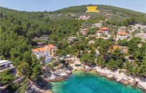 an aerial view of a resort on a hill with blue water at Amazing Home In Blato With Wifi in Blato
