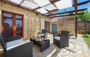 Posedenie v ubytovaní Holiday Home Pamici V