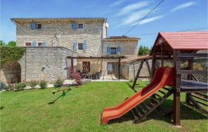 Vonkajšia záhrada v ubytovaní Holiday Home Pamici V