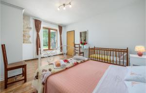 Posteľ alebo postele v izbe v ubytovaní Holiday Home Pamici V