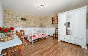 Posteľ alebo postele v izbe v ubytovaní Holiday Home Pamici V