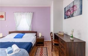 Posteľ alebo postele v izbe v ubytovaní Holiday Home Pamici V