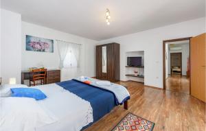Posteľ alebo postele v izbe v ubytovaní Holiday Home Pamici V