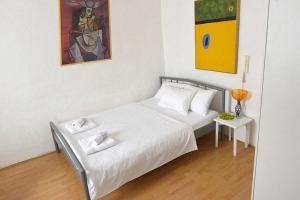 A bed or beds in a room at Apartment Belgrade center