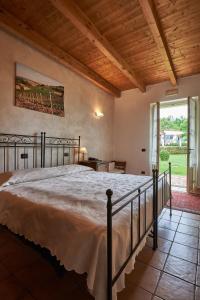 A bed or beds in a room at Agriturismo Podere La Piazza
