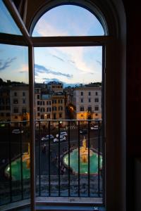 a view of a city from a window at Penthouse Suite Rome in Rome