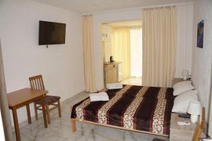 Ένα ή περισσότερα κρεβάτια σε δωμάτιο στο Villa Stanivukovic