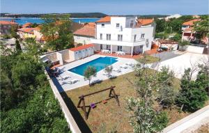 an aerial view of a house with a swimming pool at Cozy Home In Medulin With Wifi in Medulin