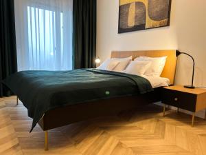 Posteľ alebo postele v izbe v ubytovaní Apartamenty Kalina z widokiem na góry - Kilińskiego
