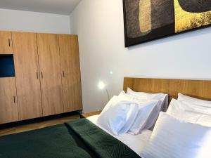 Posteľ alebo postele v izbe v ubytovaní Apartamenty Kalina z widokiem na góry - Kilińskiego