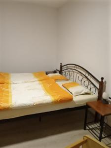 Postel nebo postele na pokoji v ubytování V centru