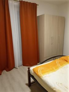 Postel nebo postele na pokoji v ubytování V centru