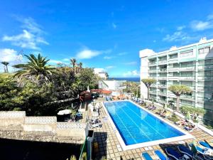 Estudio E rodeado de jardín tropical, Wifi, piscina en Puerto ...