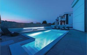 a swimming pool on the roof of a house at Three-Bedroom Holiday Home In Razanj in Ražanj