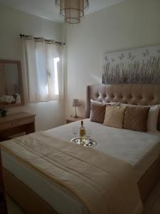 Postel nebo postele na pokoji v ubytování DIMITRIS APARTMENT