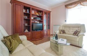 A seating area at Nice Home In Livaki With Kitchen