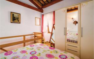 Łóżko lub łóżka w pokoju w obiekcie One-Bedroom Holiday Home In Bartici