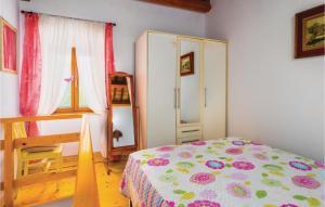 Łóżko lub łóżka w pokoju w obiekcie One-Bedroom Holiday Home In Bartici